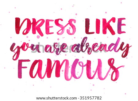 Dress like you are already famous. Inspirational quote about fashion and clothes. Pink watercolor brush lettering, custom calligraphy. Bright motivational slogan.