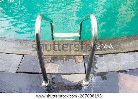 swimming pool with steel stair