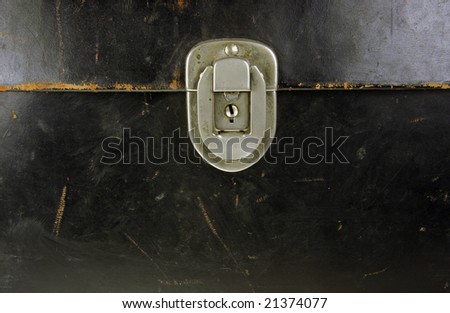 Lock in dark leather briefcase