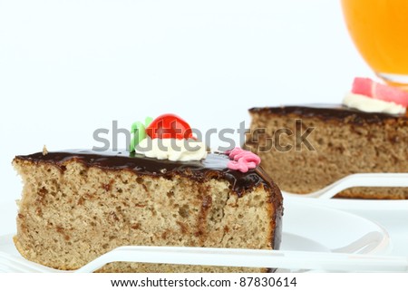 chocolate-cake with orange juice  on white background