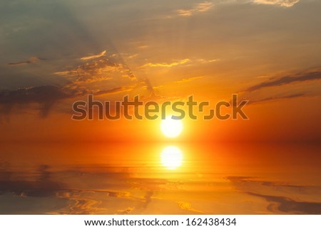 calm sea, the sun, the rays - the sunset at sea