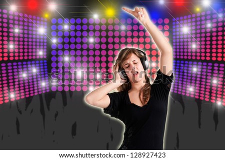 Woman dancing using headphones with disco lights in the background