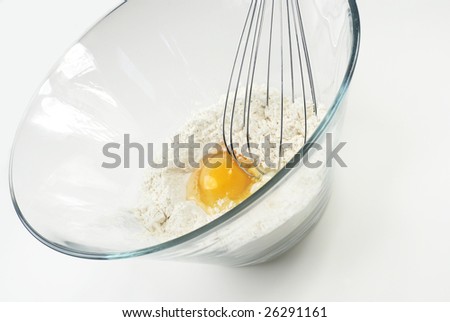 Whisking eggs with flour