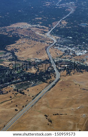 Californian highway running through the hills, aerial view