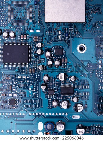 Close up of blue circuit board background of computer motherboard.
