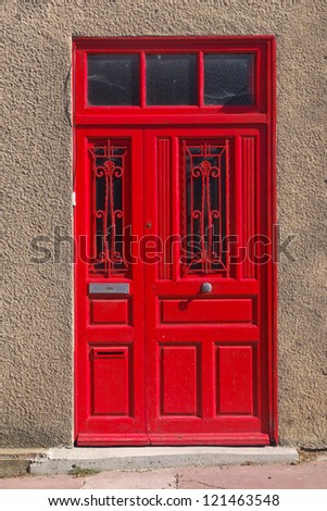 Architecture Detail of a Red Door in France