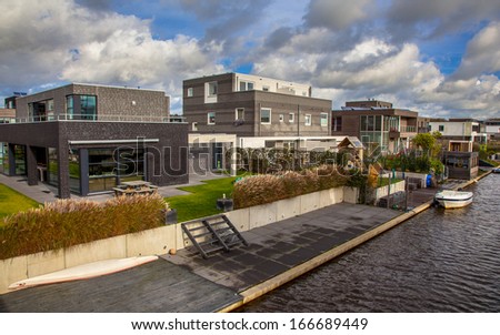 Modern residential Middle Class Houses on the Water Front in a Suburban Area