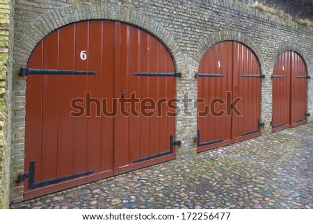 Red Doors of a Historic Ammunition Depot used as Wine Cellar in the Fortified Town of Bourtange