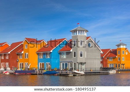 Waterfront houses in various colors in Groningen, Netherlands