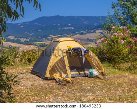 Dome Tent on a Camping Place with View over a Valley in Southern Europe