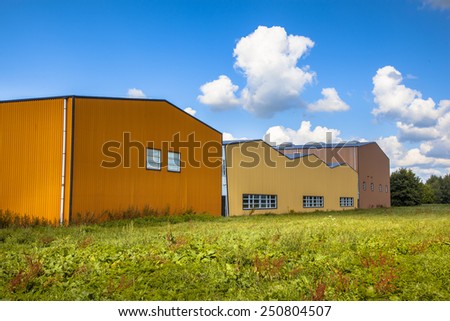 Colorful new contemporary industrial building in a commercial area under development