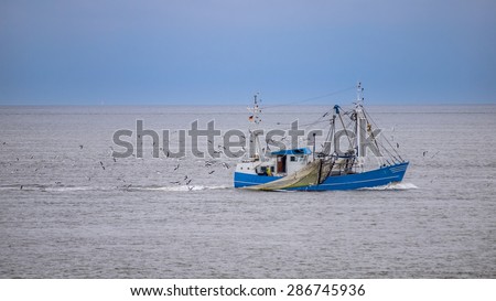 Fishing vessel on the waddensea, part of the traditional dutch fishing fleet