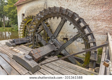 Water wheel driven watermill at Singraven castle in Dinkelland, Netherlands