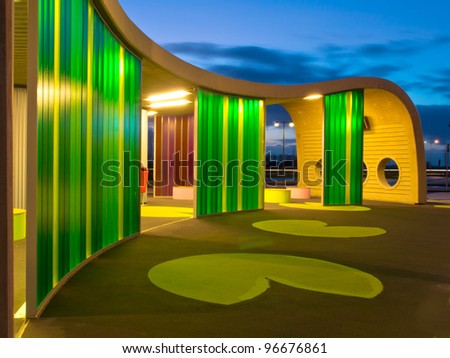 Green colored waiting area of a bus station