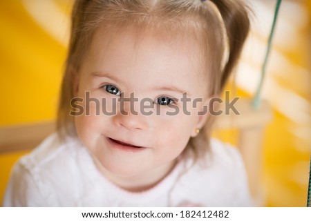 Emotions of a little girl with Down syndrome