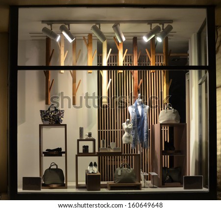 Boutique Window With Shoes, Bags And Mannequin