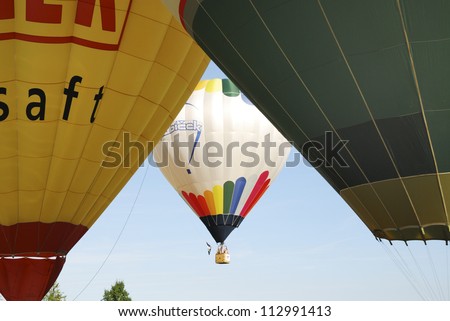 BAD GRIESBACH, GERMANY - AUGUST 17. Hot air balloons at the 19th hot air balloon festival of Bad Griesbach, Germany on August 17, 2012. Every year about 20 balloons take part at the competition.
