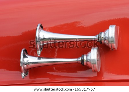 Signal horn of a red vintage fire truck