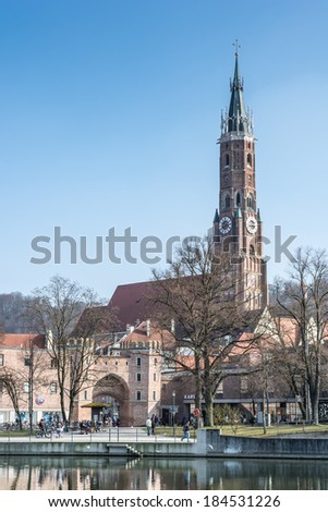 LANDSHUT, GERMANY - MARCH 8. Basilica St. Martin in Landshut, Germany on March 8, 2014. The basilica St. Martin on the right has the highest clinker tower of the world.