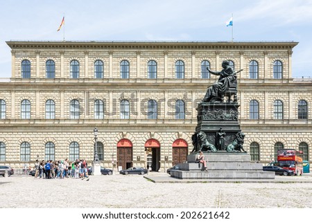 MUNICH, GERMANY - JUNE 4: Tourists at the Residence of  Munich, Germany on June 4, 2014. Munich is the biggest city of Bavaria  with almost 100 million visitors a year.