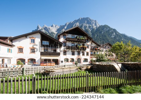 MITTENWALD, GERMANY - SEPTEMBER 27: Shops in the village of Mittenwald, Germany on September 27, 2014. Mittenwald is famous for the manufacture of violins, violas and cellos.