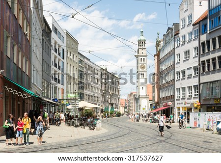 AUGSBURG, GERMANY - JULY 25: Tourists in the city of Augsburg, Germany on July 25, 2015.  It is the 2nd oldest town of Germany, visited by 600,000 tourists every year.