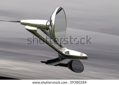 stock photo Outside mirror of a black old timer