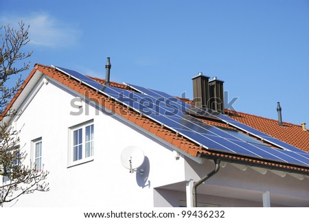 House roof with photovoltaics installation