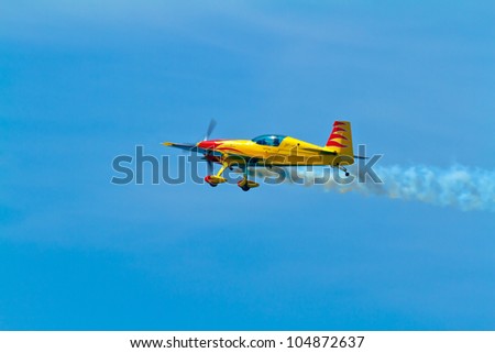 CADIZ, SPAIN-SEP 11: Aircraft Extra 300S of Melissa Pemberton taking part in an exhibition on the 4th airshow of Cadiz on Sep 11, 2011, in Cadiz, Spain