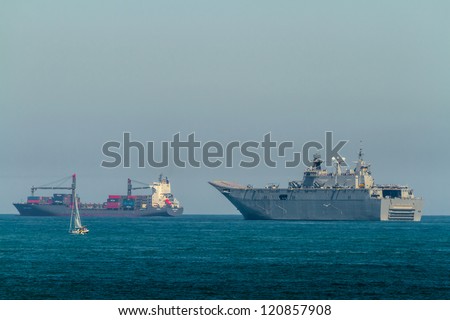 CADIZ, SPAIN-JUN 04: Aircraft carrier L-61 Juan Carlos I setting sail after taking part in an exhibition on the day of the spanish army forces on Jun 04, 2012, in Cadiz, Spain