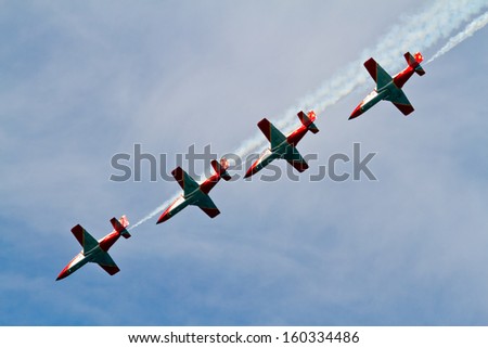 CADIZ, SPAIN-SEP 9: Aircrafts of the Patrulla Aguila taking part in a test on the 4th airshow of Cadiz on Sep 9, 2011, in Cadiz, Spain