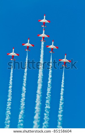 CADIZ, SPAIN-SEPT 9: Aircrafts of the Patrulla Aguila take part in a test on the 4th airshow of Cadiz on Sept 9, 2011, in Cadiz, Spain