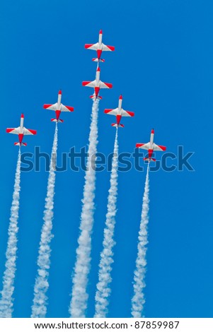 CADIZ, SPAIN-SEPT 9: Aircrafts of the Patrulla Aguila taking part in a test on the 4th airshow of Cadiz on Sept 9, 2011, in Cadiz, Spain
