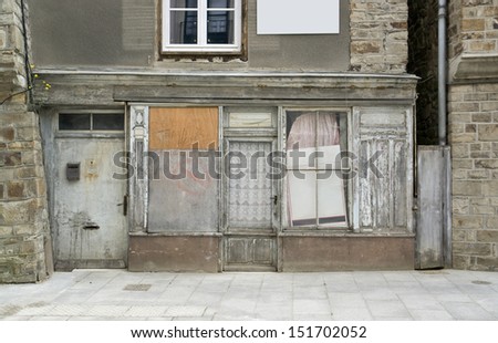 historic rundown house facade seen in Vitre (Brittany, France)