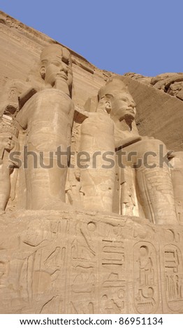 architectural detail including some big stone sculptures and hieroglyphics at the historic Abu Simbel temples in Egypt (Africa)