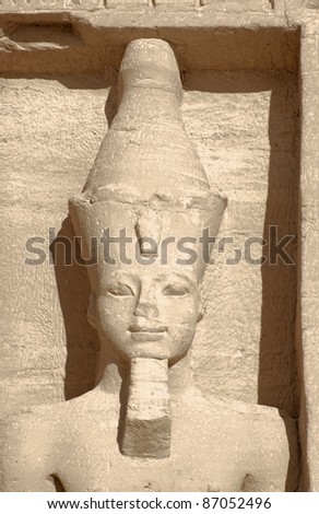 sunny illuminated architectural detail of a stone made sculpture at the historic Abu Simbel temples in Egypt (Africa)