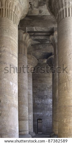 ancient scenery around Edfu Temple of Horus in Egypt with big columns