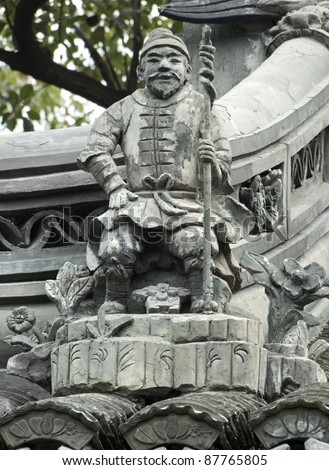 architectural detail including a historic stone sculpture at the Yuyuan Garden in Shanghai (China)