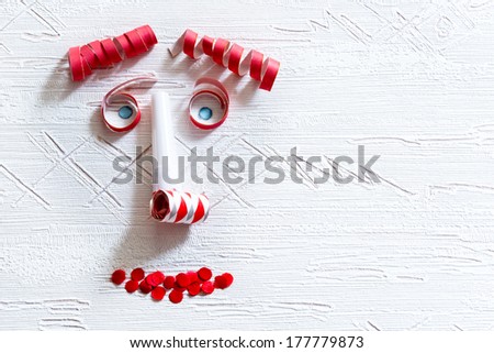 a man face from colored carnivals decoration