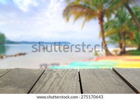 Defocus and blur image of terrace wood and Beautiful sea for background usage