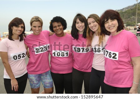 Breast cancer awareness charity race: Diverse group of women in pink