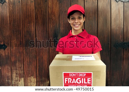 young delivery courier delivering package with copy space