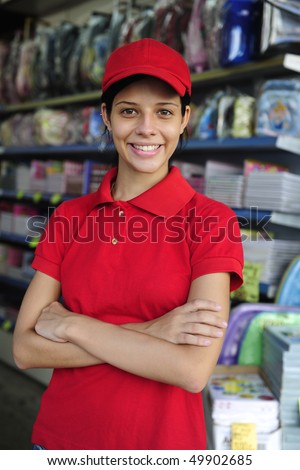 portrait of a teenage girl working part time in a stationery  shop