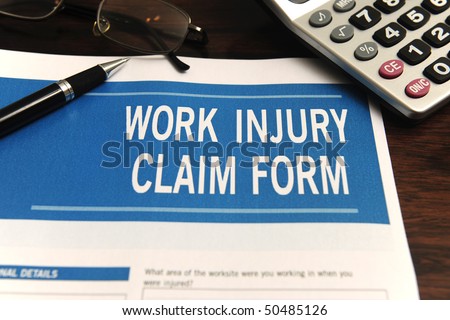 insurance: blank work injury claim form on desk (Form was created for this shooting - no property release necessary)