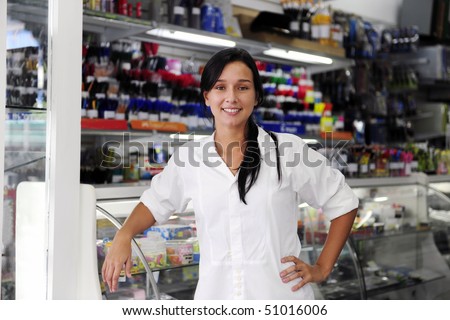 small business: happy owner of a stationery shop