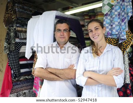 proud family business partners owners of a fabric store