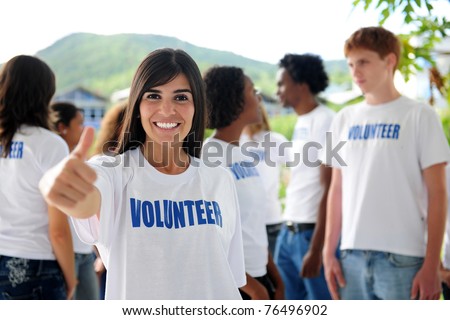 Happy Volunteer Woman Showing Thumbs Up 