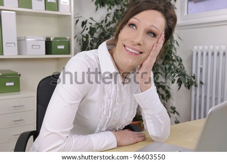 green office: business woman thinking at office