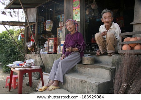 MY SON, VIETNAM - FEBRUARY 02 2007: Elderly couple during Tet Holiday New Year Period at My Son Sanctuary in Vietnam.