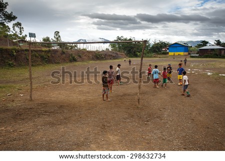 CHIN STATE, MYANMAR - JUNE 22 2015: Local boys play footbal in the recently opened for tourists Chin State Mountainous Region, Myanmar (Burma)